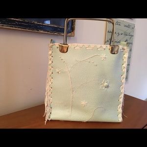 Baby blue leather and metal 70’s handbag.